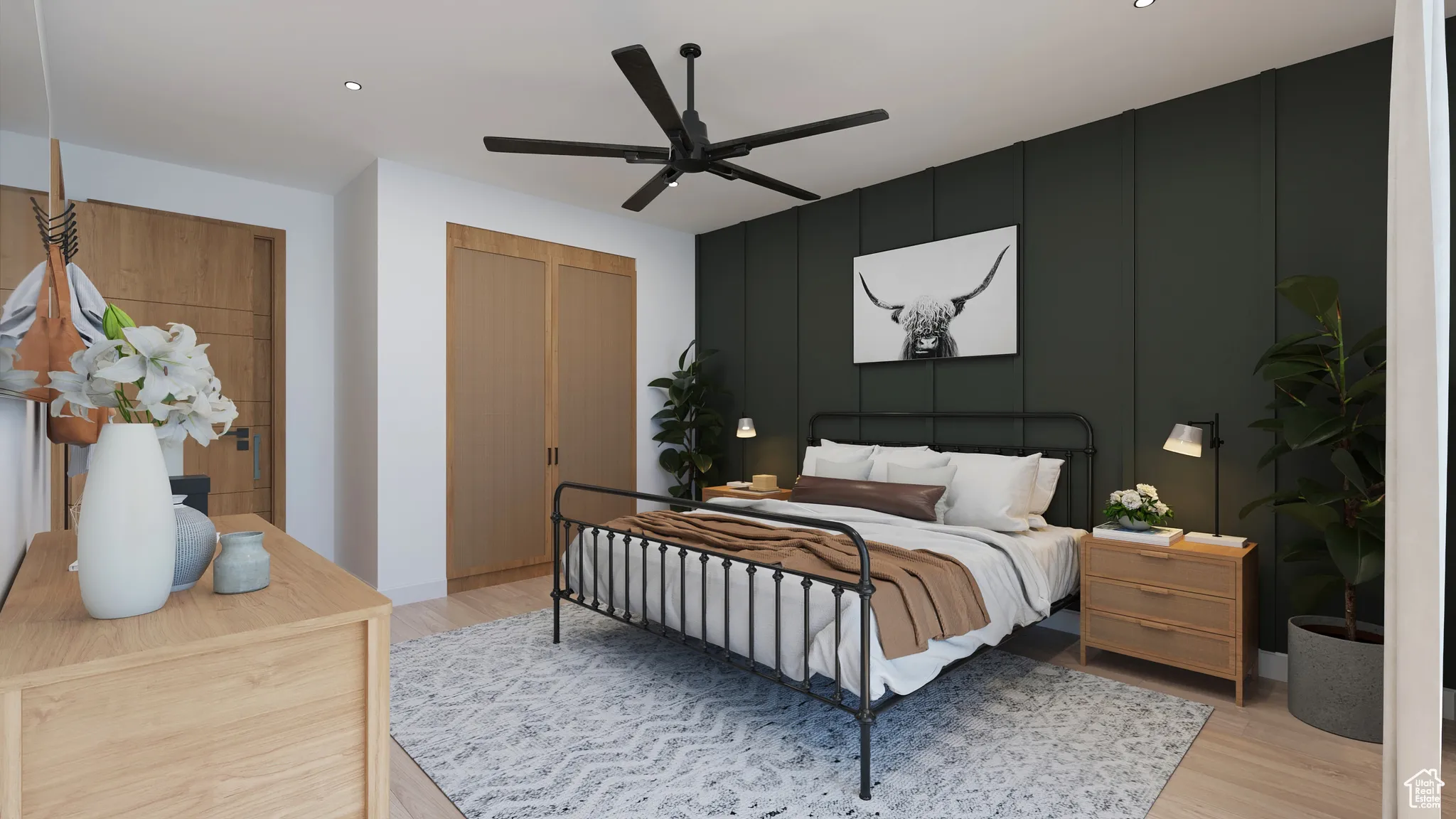 Bedroom featuring light wood-style flooring, recessed lighting, ceiling fan, a decorative wall, and a closet