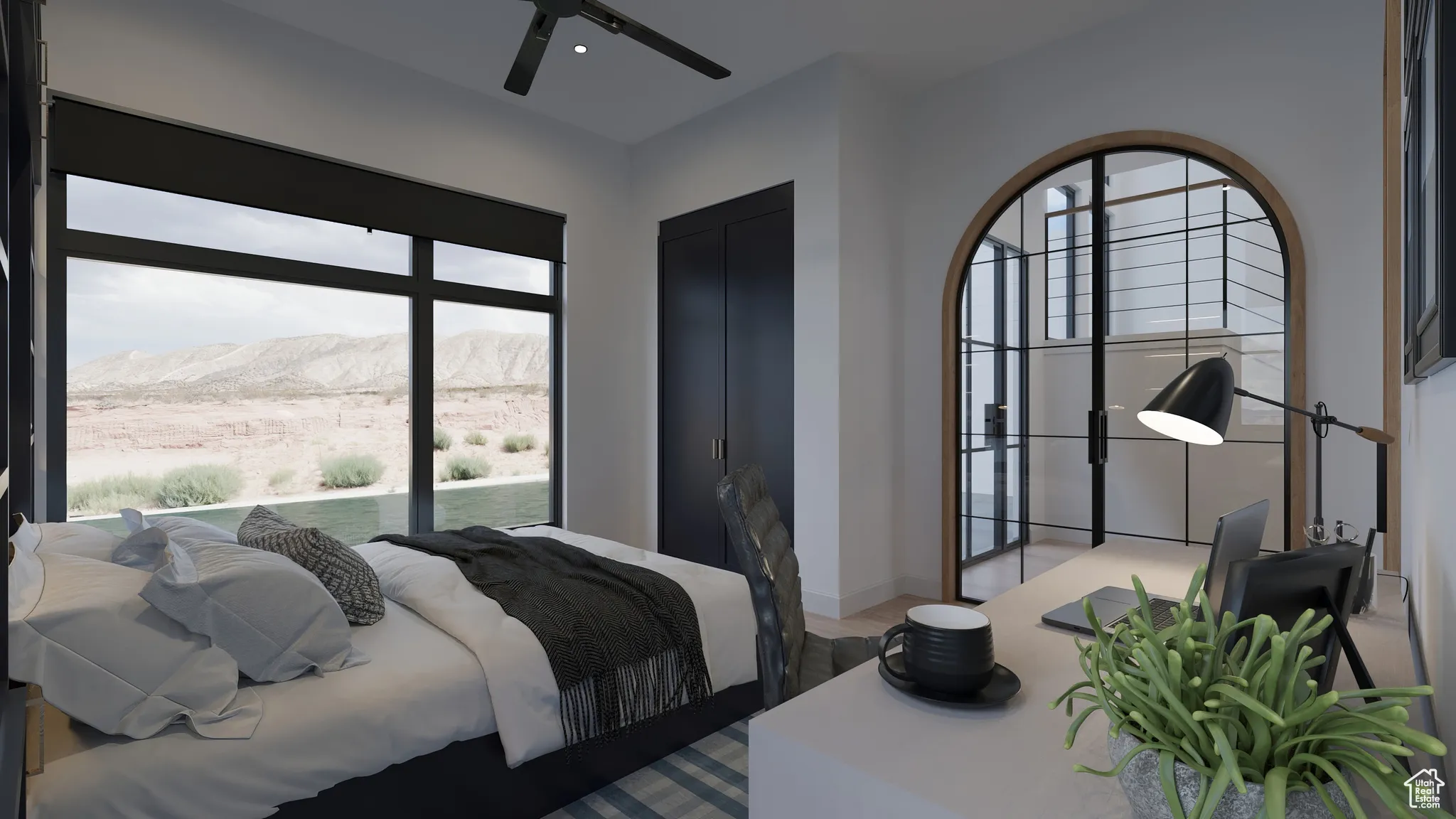 Bedroom featuring a mountain view and ceiling fan