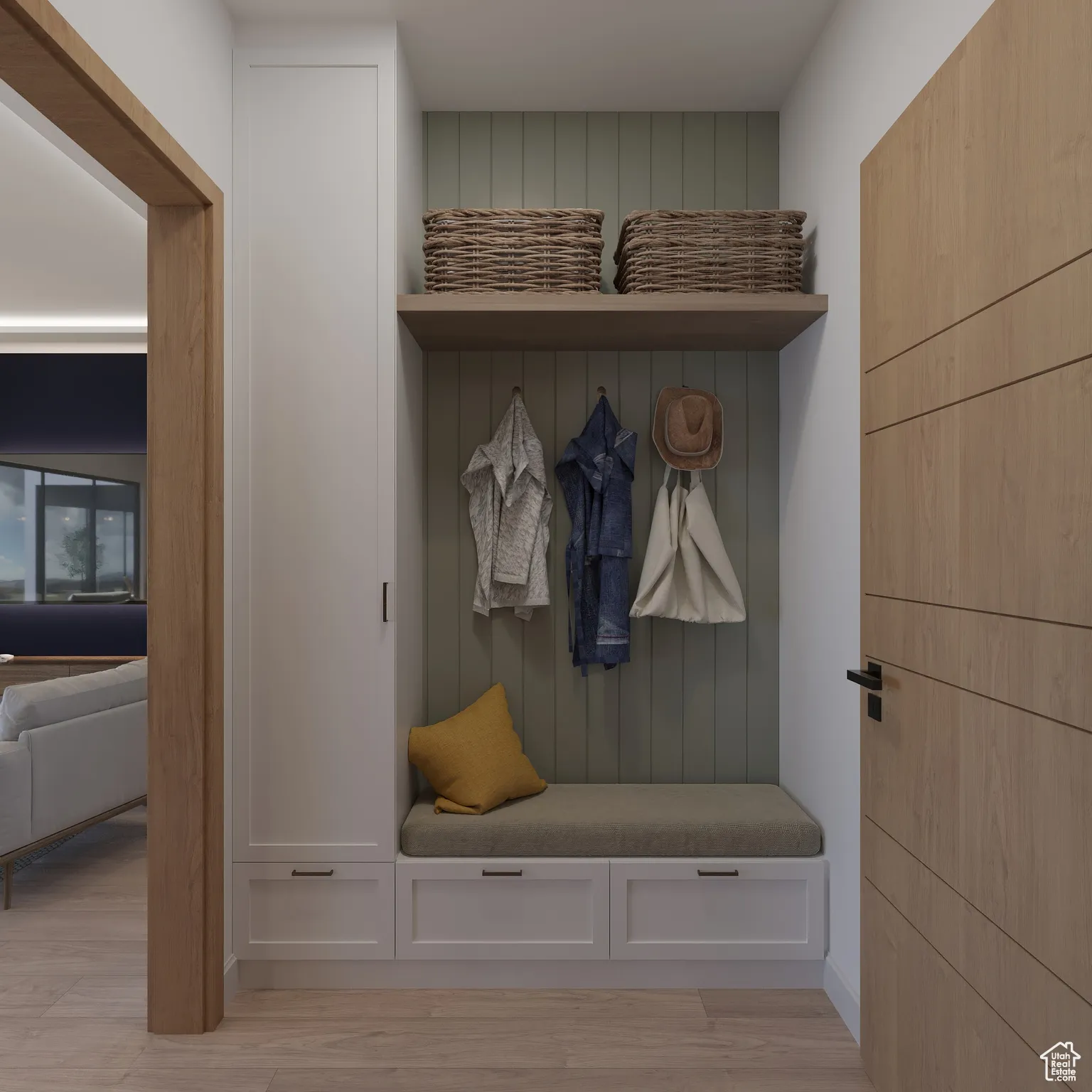 Mudroom featuring light wood finished floors