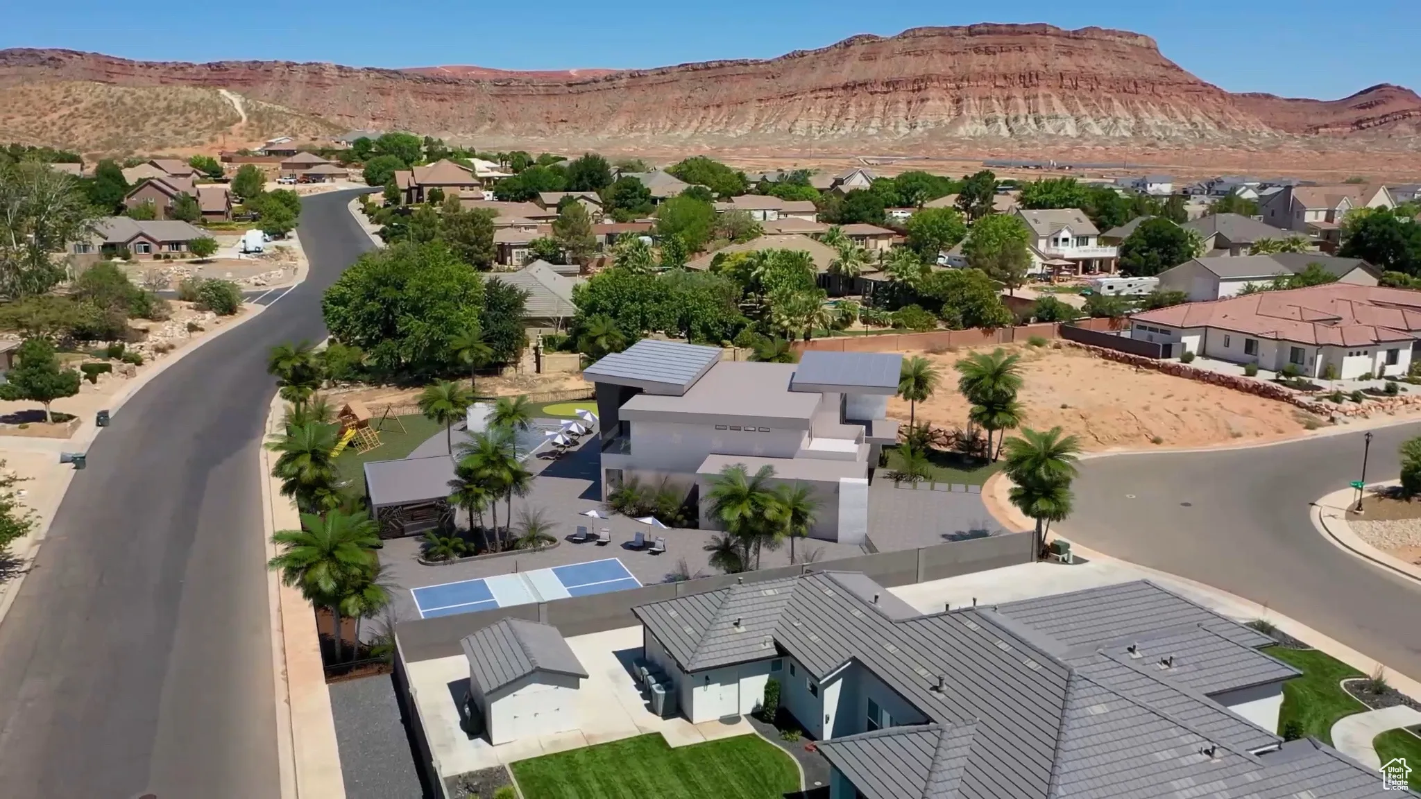 Aerial view of residential area with a mountainous background