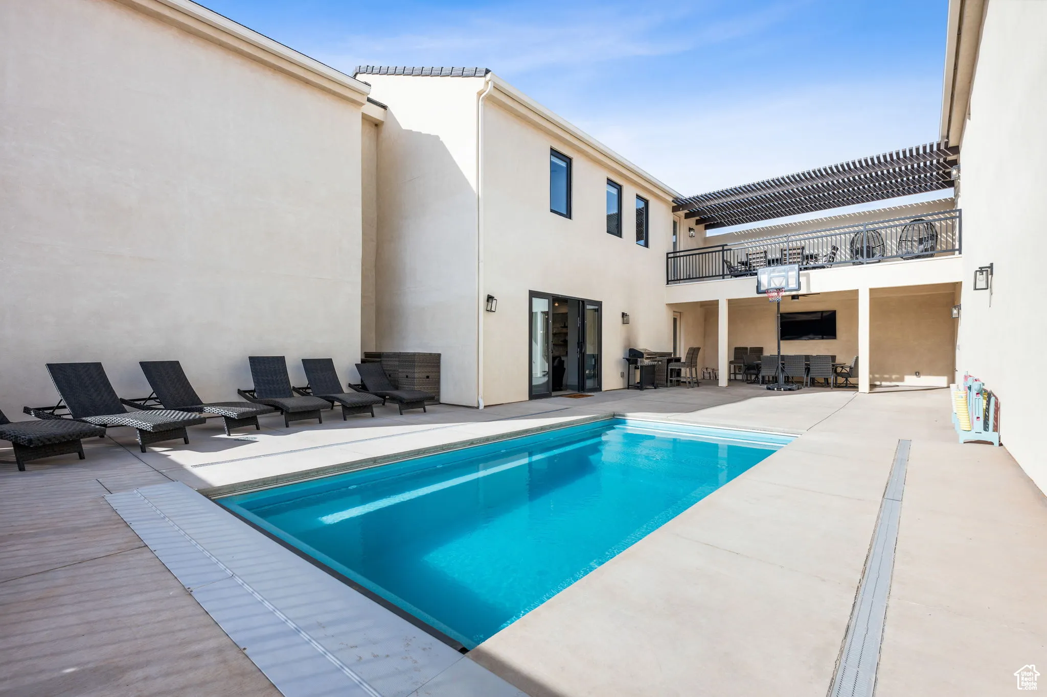 Swimming pool featuring a patio area and outdoor dining space