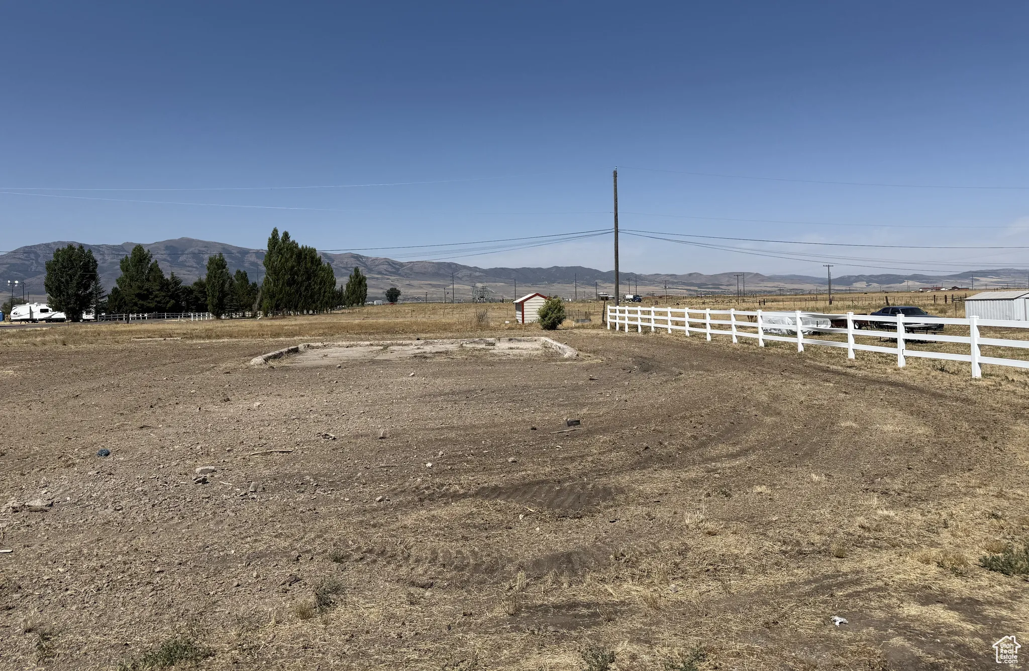 View of yard featuring a view of countryside and a mountain view