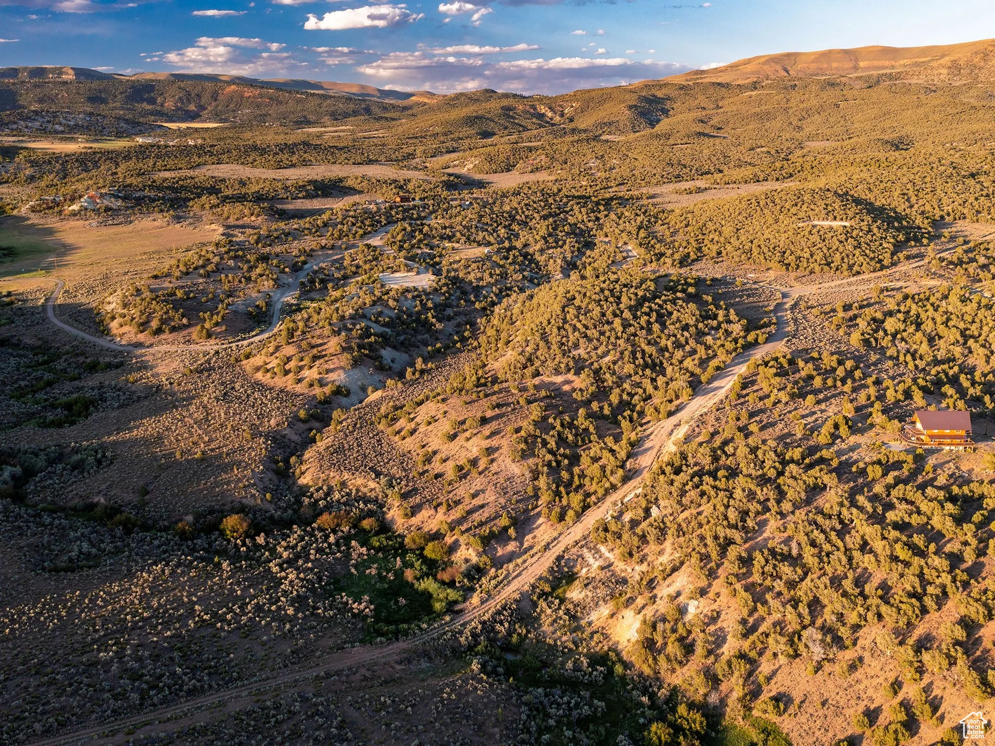 View of mountain backdrop featuring a desert landscape and rural landscape