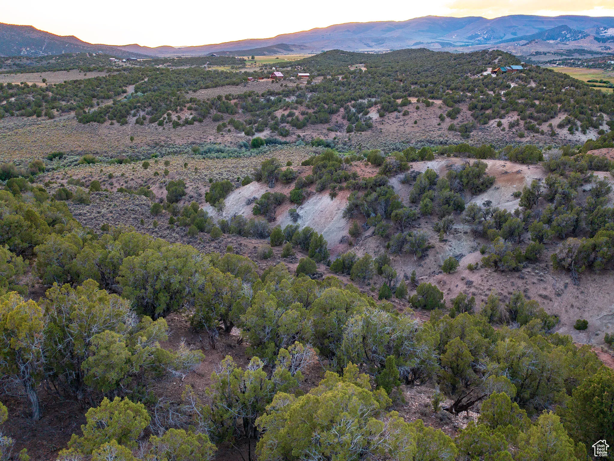 Aerial view at dusk of a mountain view and a desert view