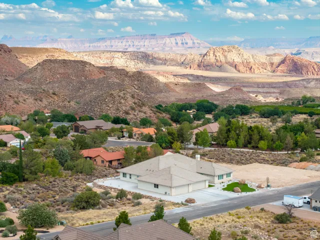View of mountain backdrop with nearby suburban area