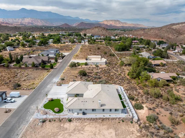 Aerial perspective of suburban area featuring mountains
