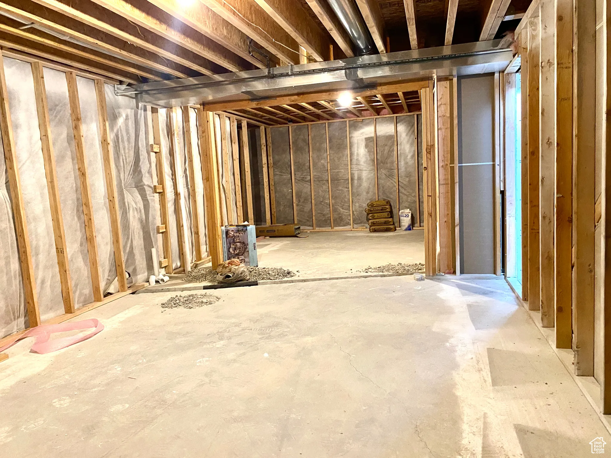 Big, fun family room ready to have sheet rock dropped.