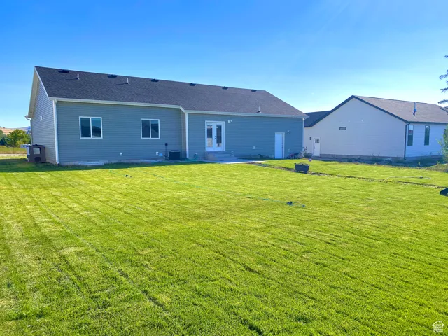 Rear view of house faces North.  .29 acres lot with plenty of space between houses on the sides.