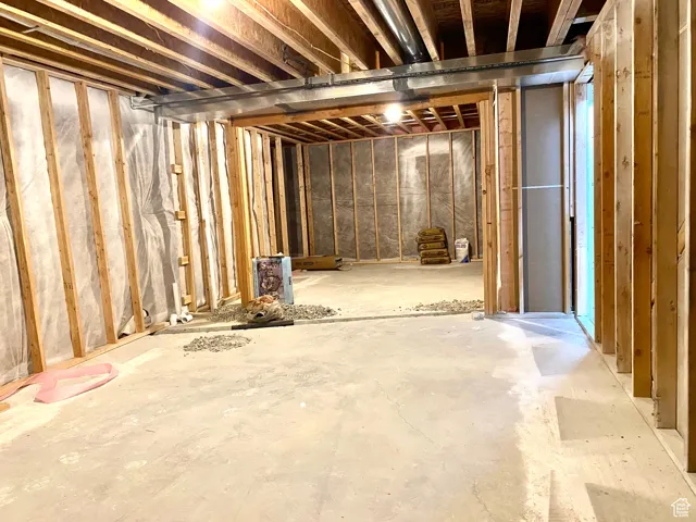 Big, fun family room ready to have sheet rock dropped.