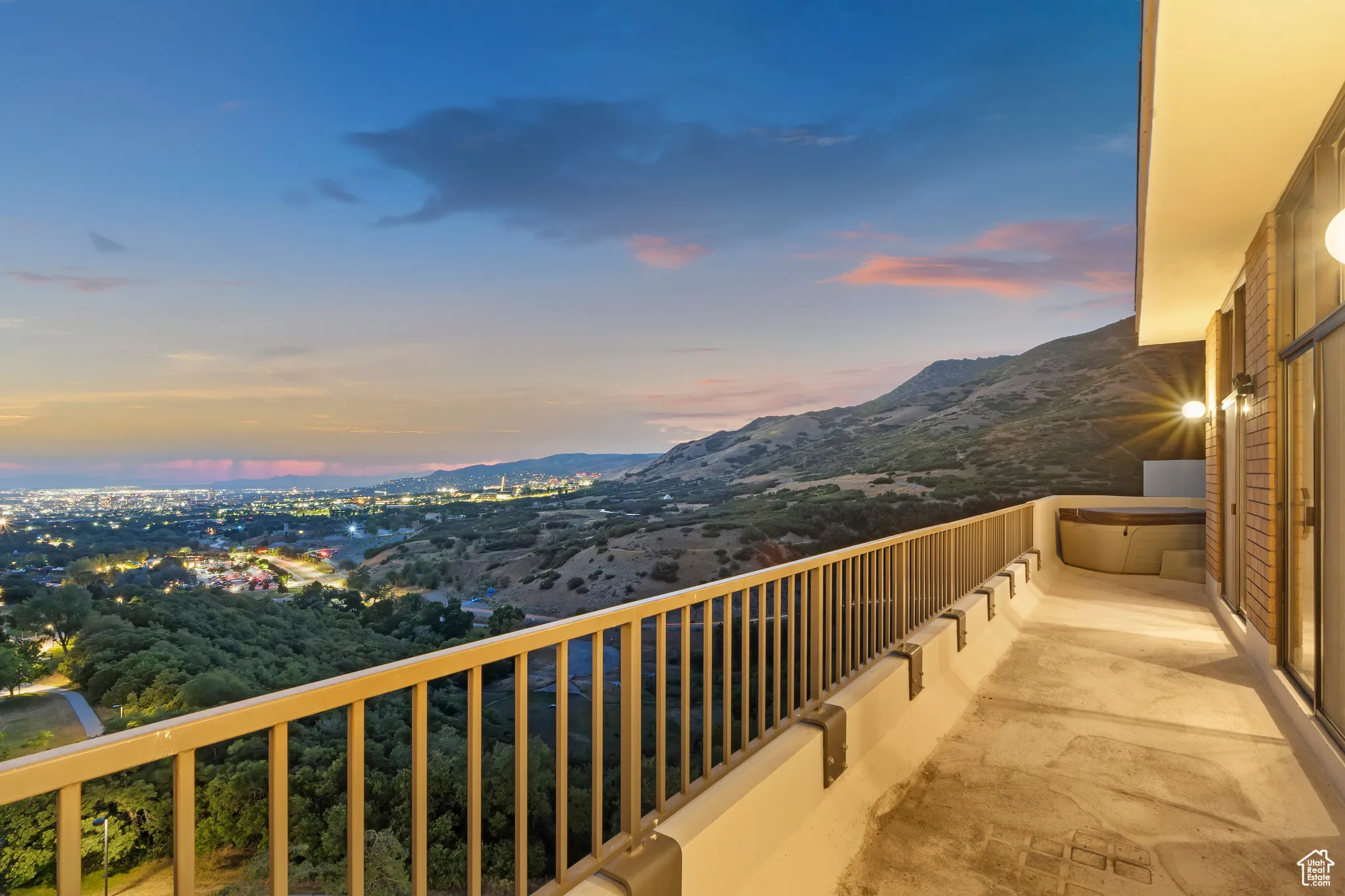Balcony at dusk with a mountain view