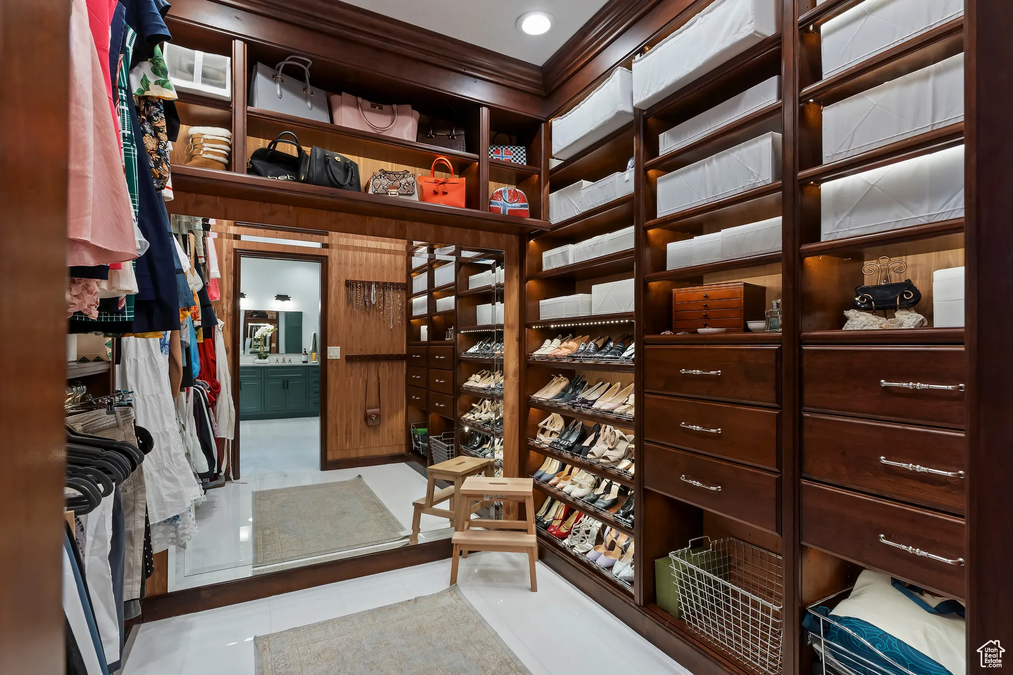Spacious closet featuring tile patterned flooring