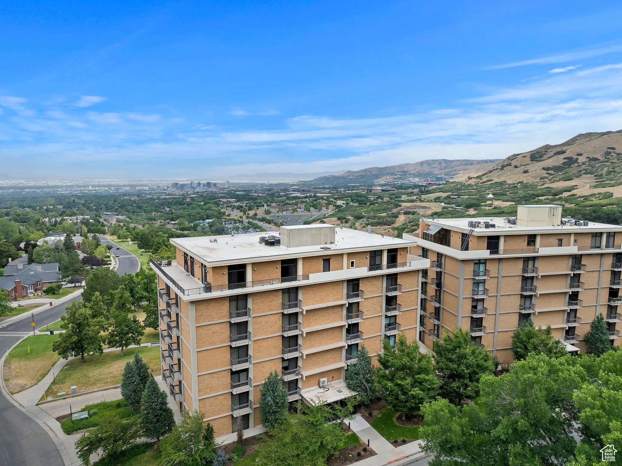 View of apartment building / complex with a mountain view