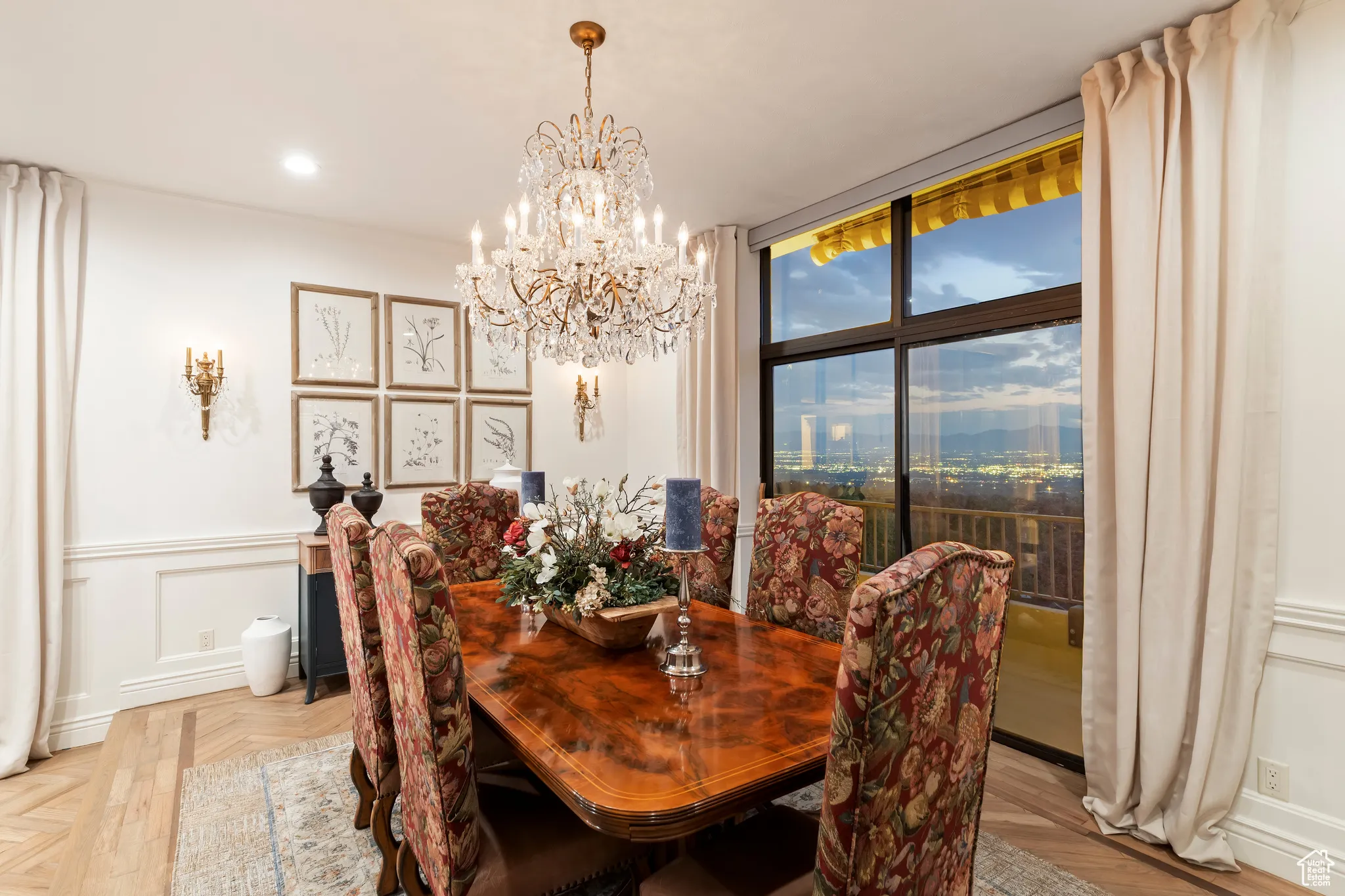 Dining space with a wainscoted wall, a chandelier, a decorative wall, and recessed lighting