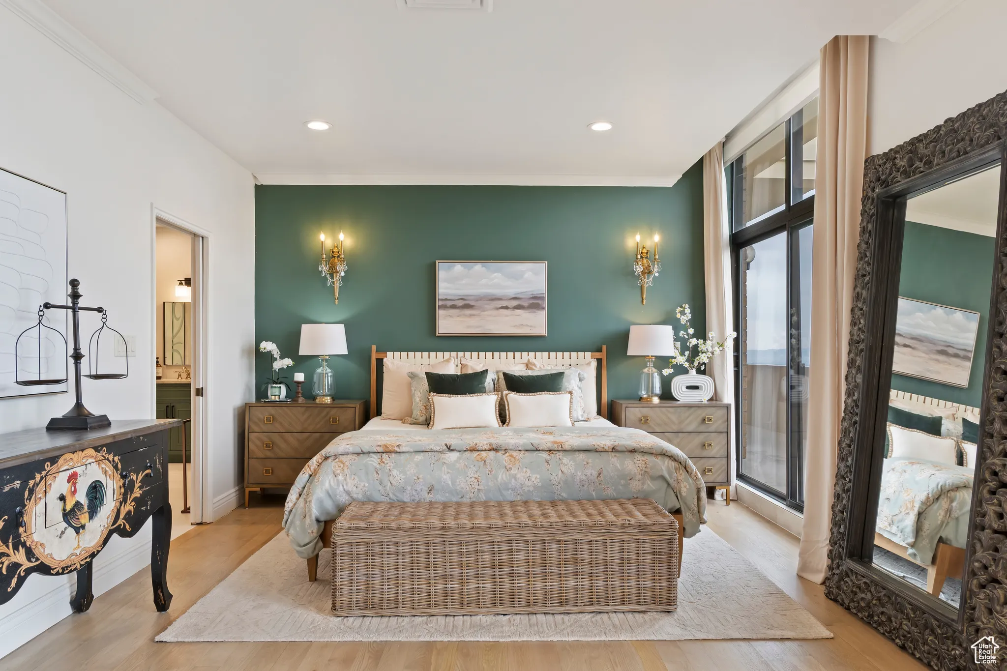 Bedroom featuring crown molding, wood finished floors, recessed lighting, access to exterior, and ensuite bath