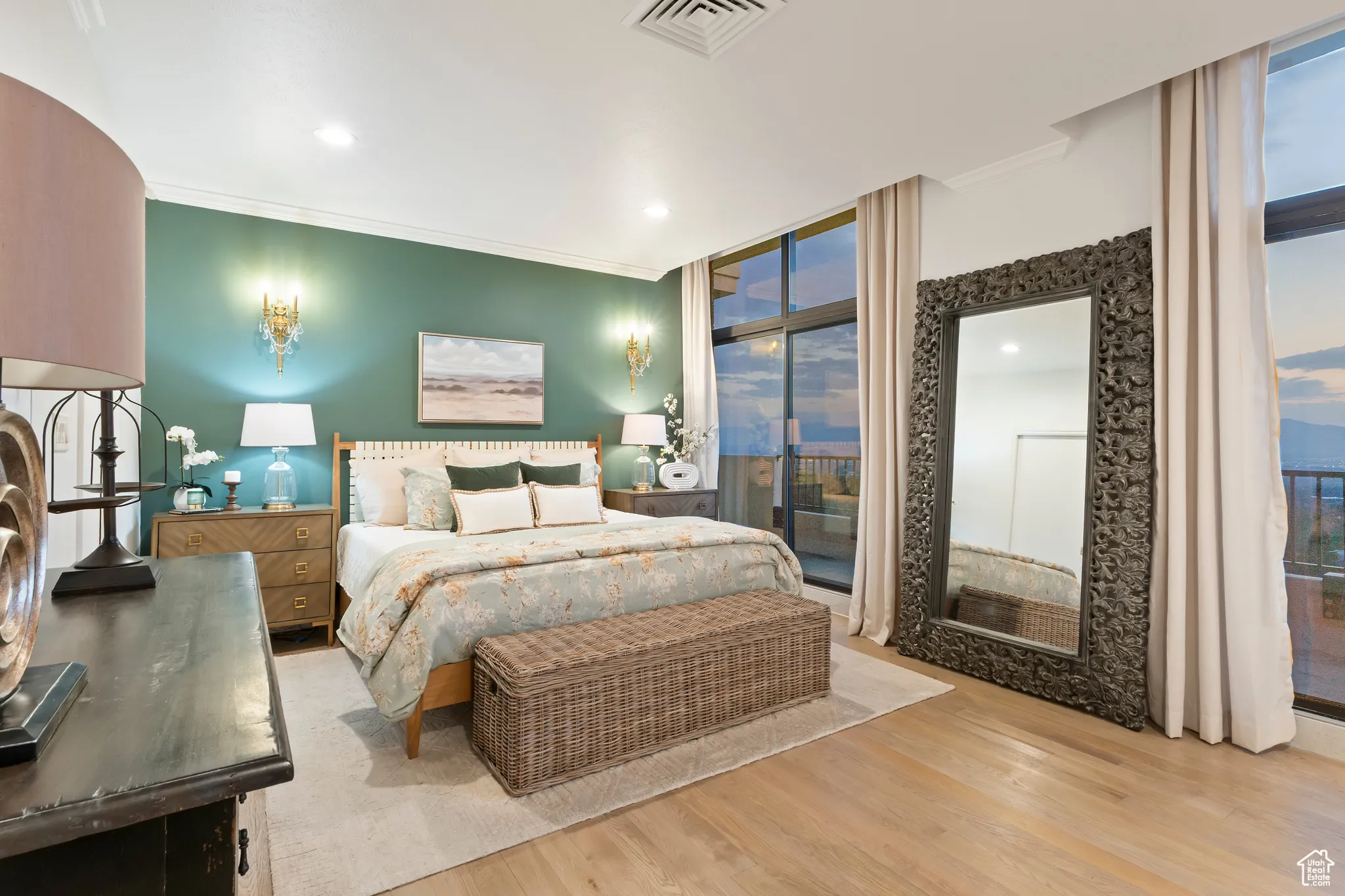 Bedroom featuring access to exterior, wood finished floors, ornamental molding, recessed lighting, and expansive windows