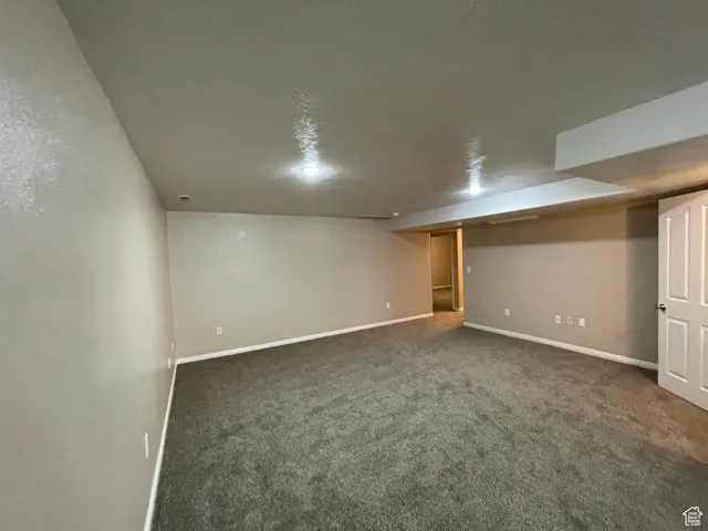 Finished below grade area with carpet and baseboards