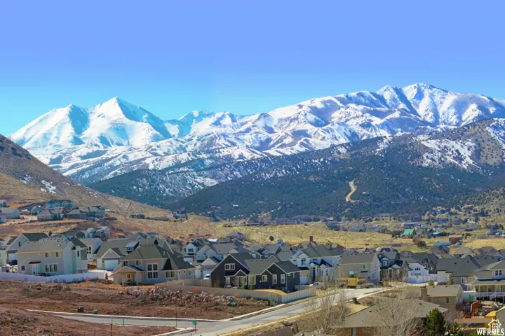 View of mountain background featuring nearby suburban area