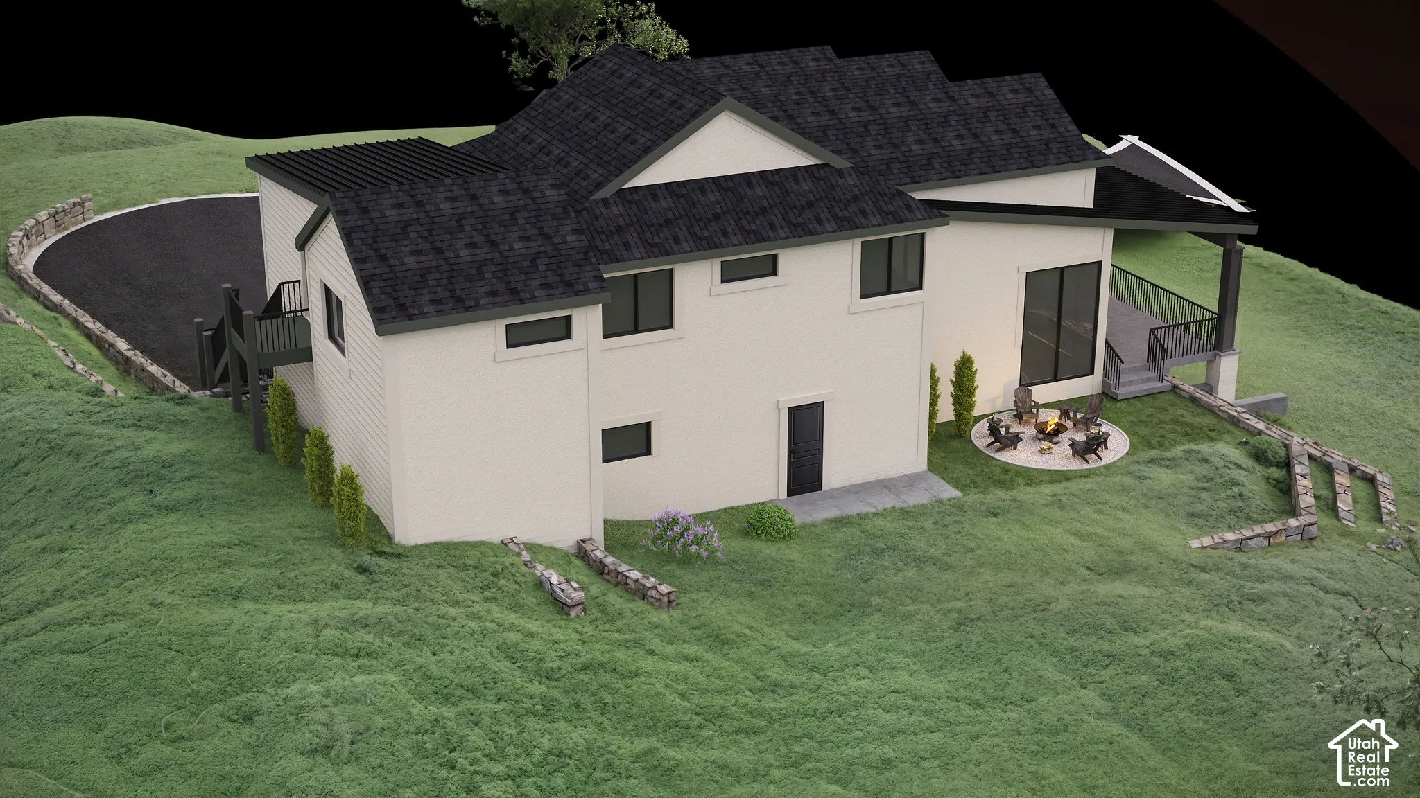 Rear side view of house with a yard and fire place.