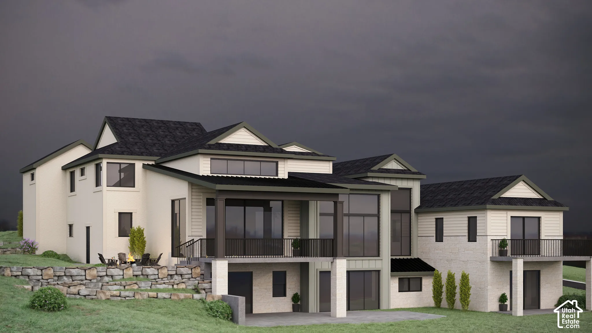 View of back of house with a front lawn, a patio, roof with shingles, and a sunroom