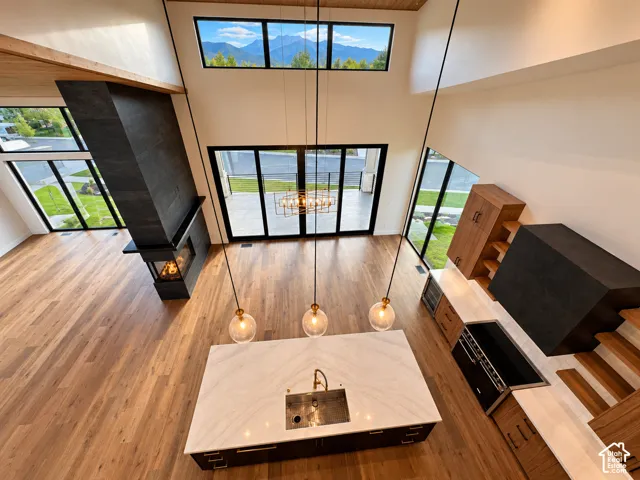 High ceilings complement the wood-finish flooring