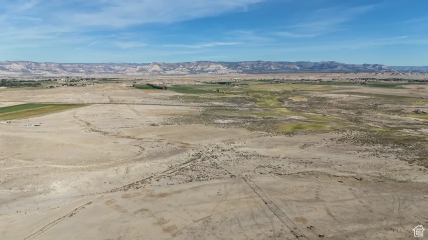 View of mountain backdrop featuring a desert landscape and rural landscape