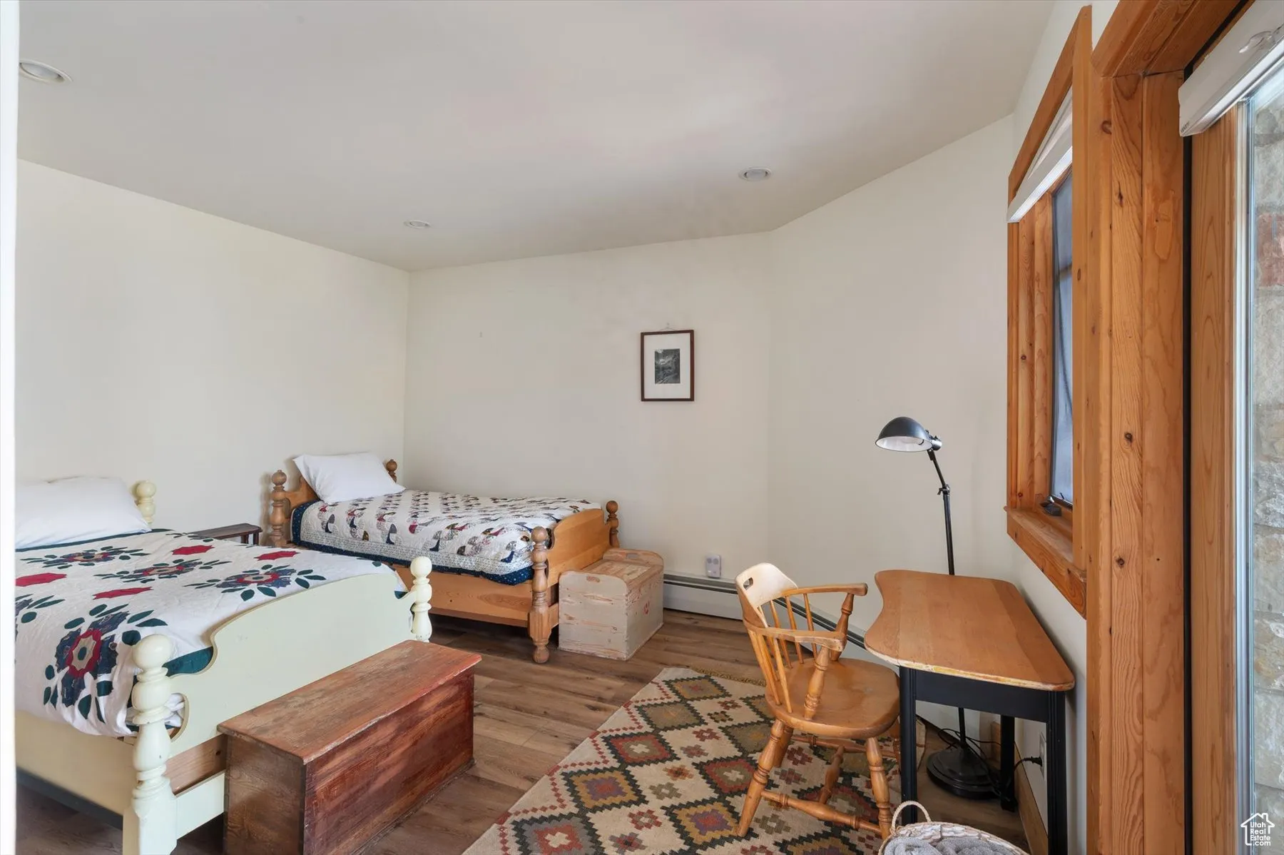 Second bedroom on the lower level with great views and access to a the exterior hot tub through French doors