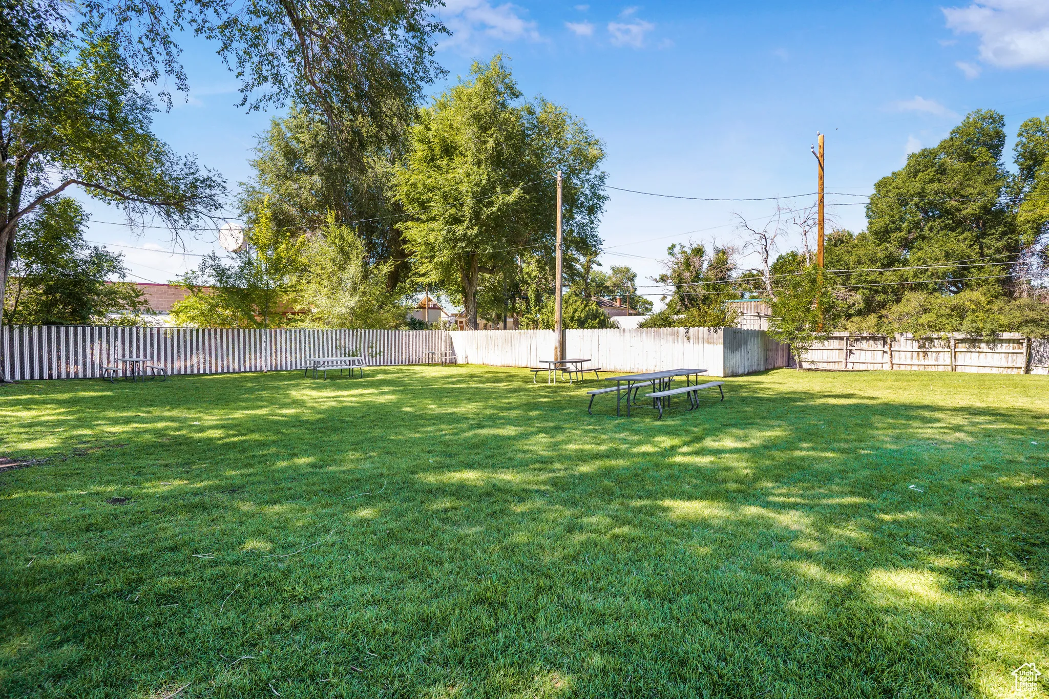 View of fenced backyard