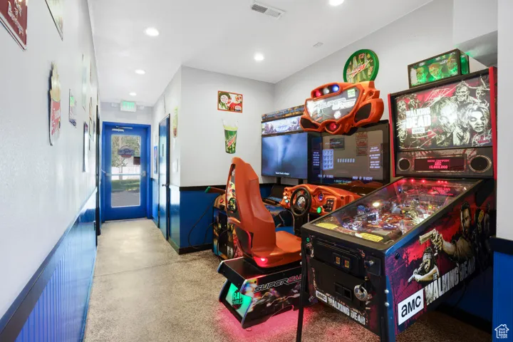 Recreation room featuring recessed lighting