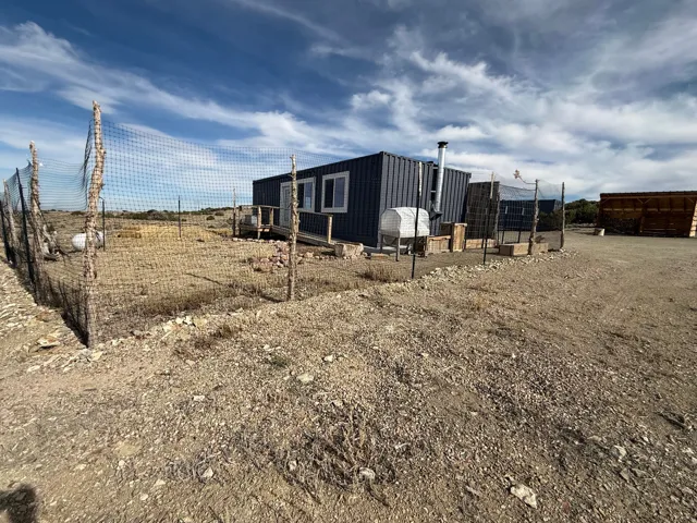 View of yard featuring an outbuilding