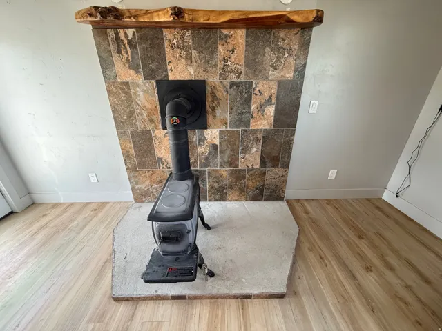Detailed view of wood finished floors and baseboards