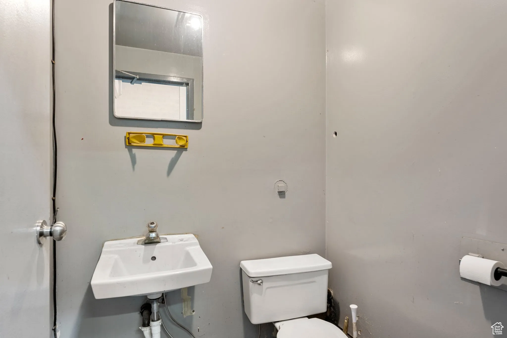 Bathroom featuring toilet and a sink