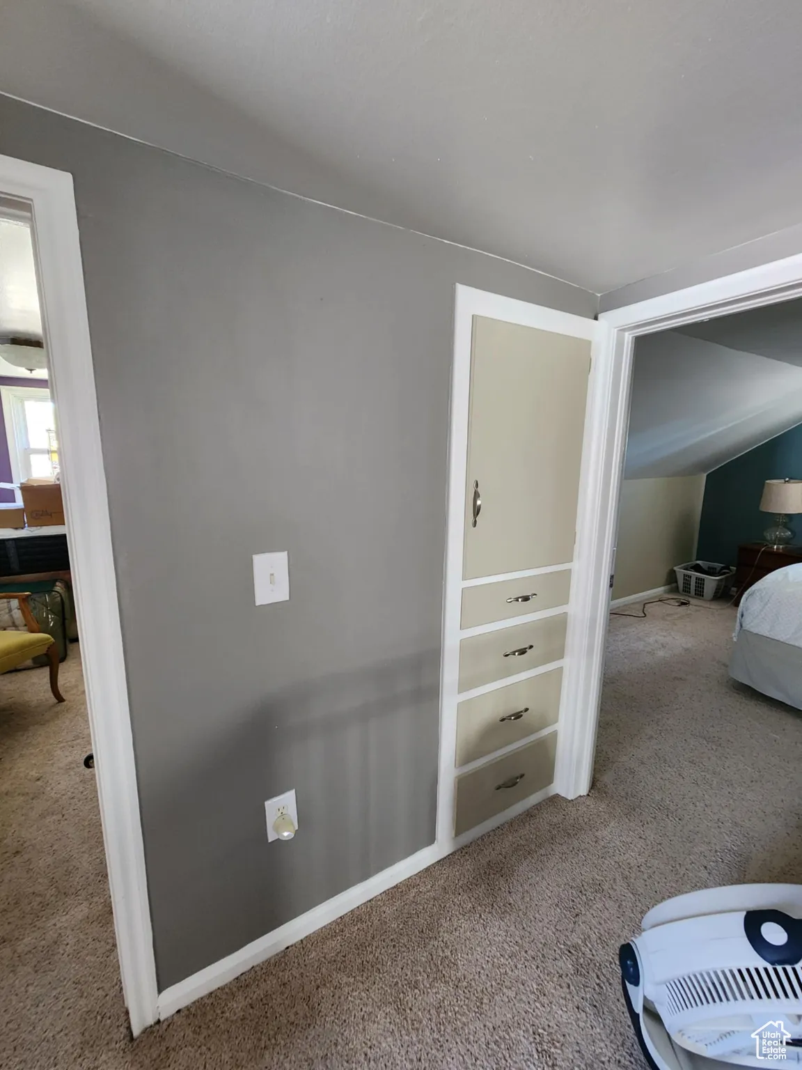 Bedroom with light carpet