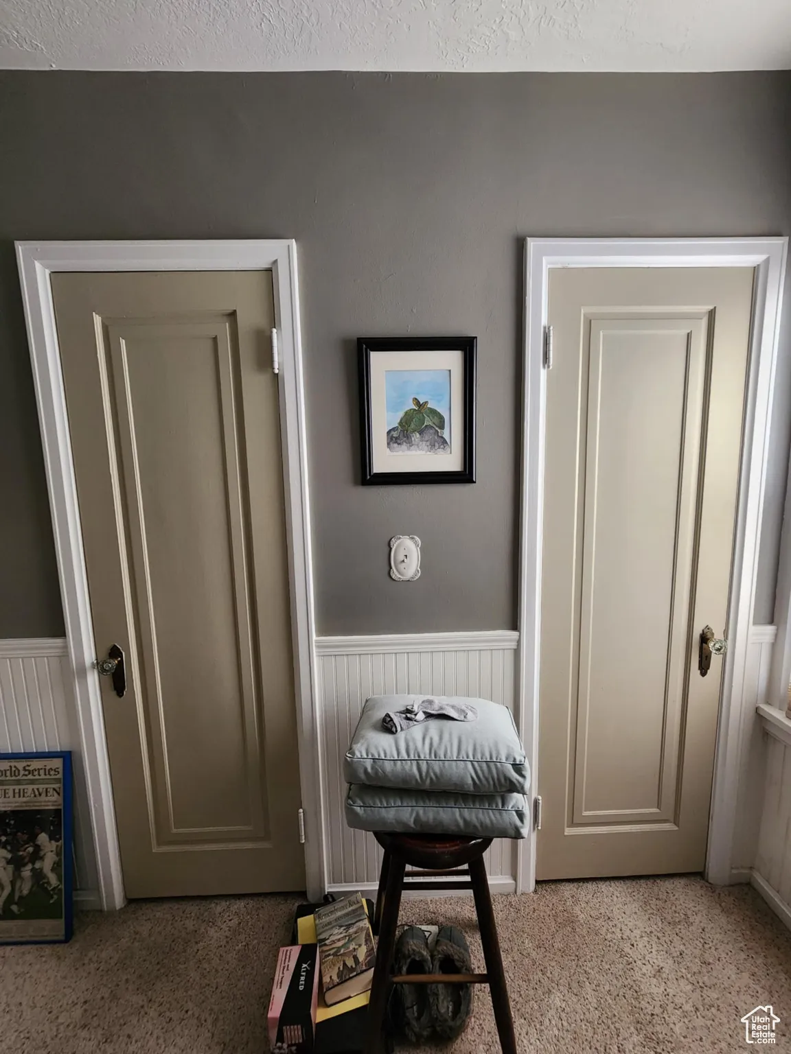 Sitting room featuring light carpet
