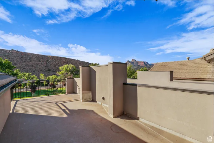 View of patio / terrace with a mountain view