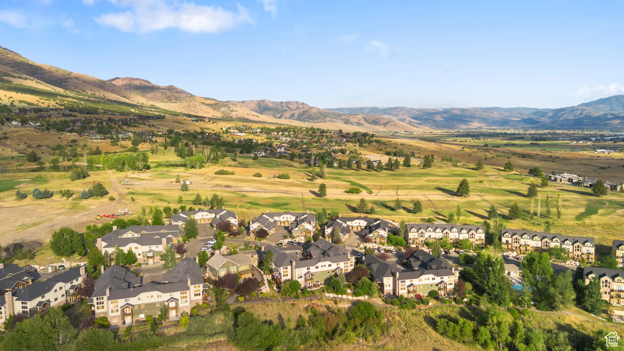 View of property location with nearby suburban area and a mountainous background