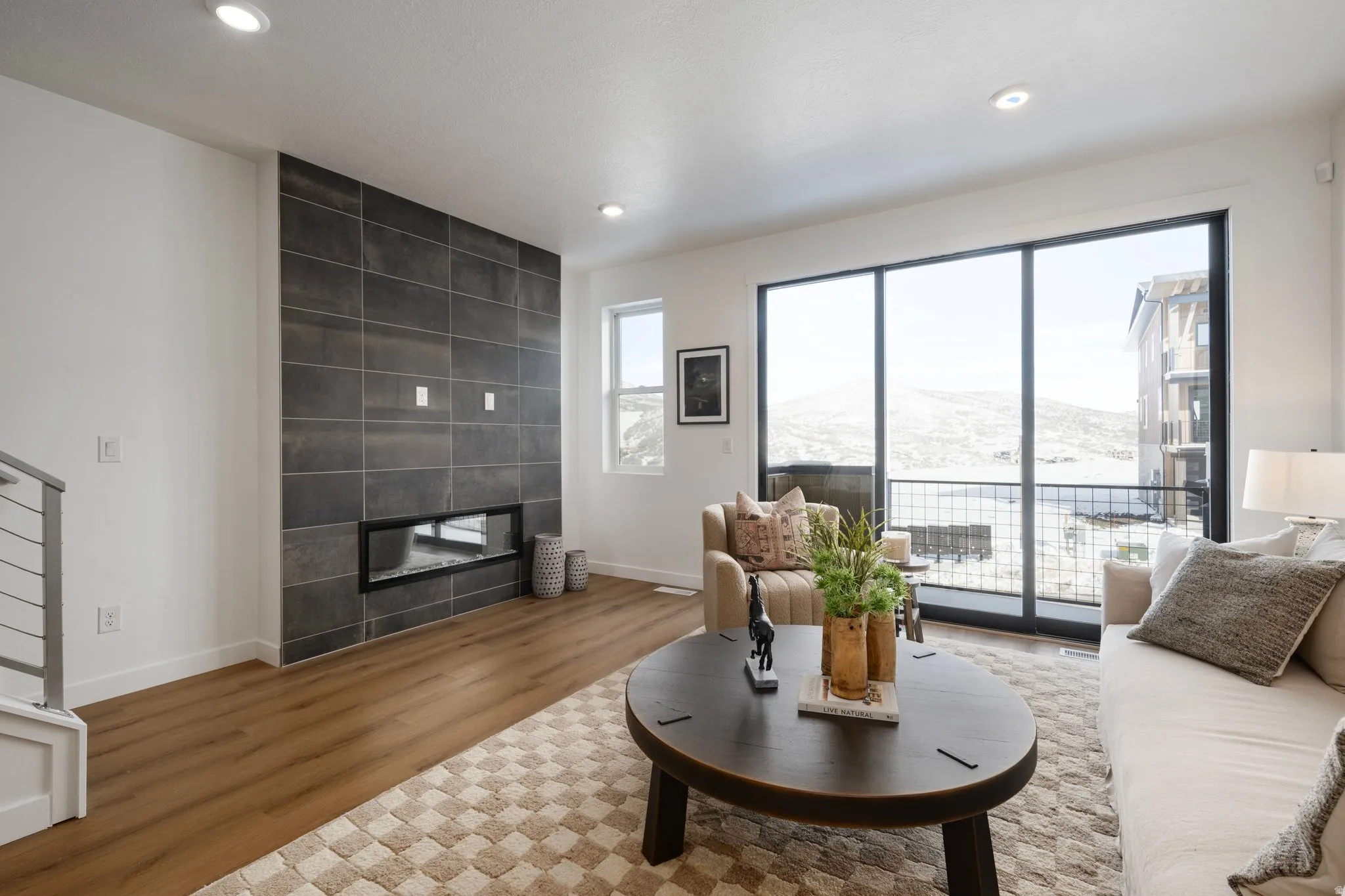 The heart of the home with large windows, great flow, and a vibe that's both relaxing and stylish. *model home