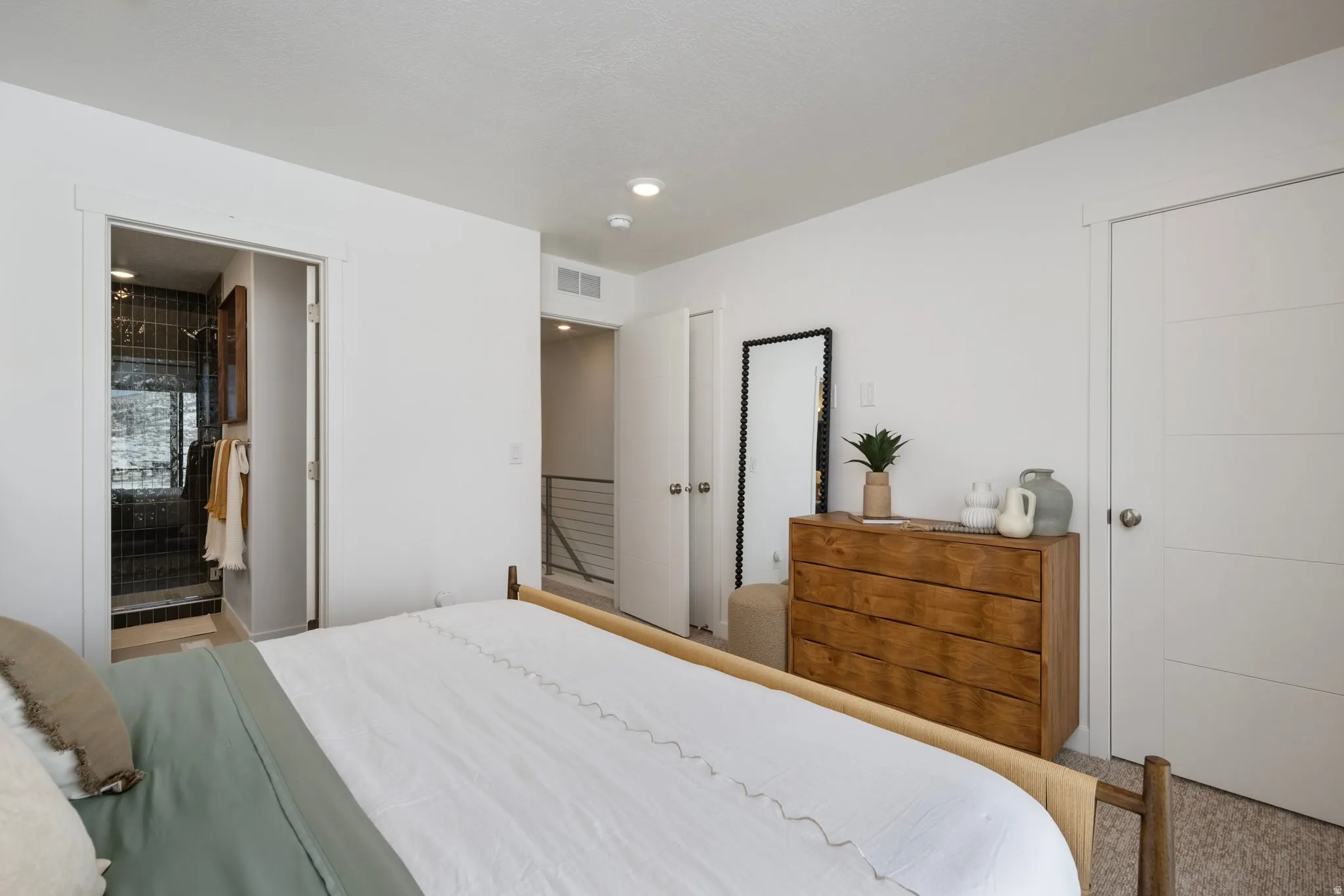 A true suite escape-this bedroom brings all the cozy vibes without sacrificing style. *model home
