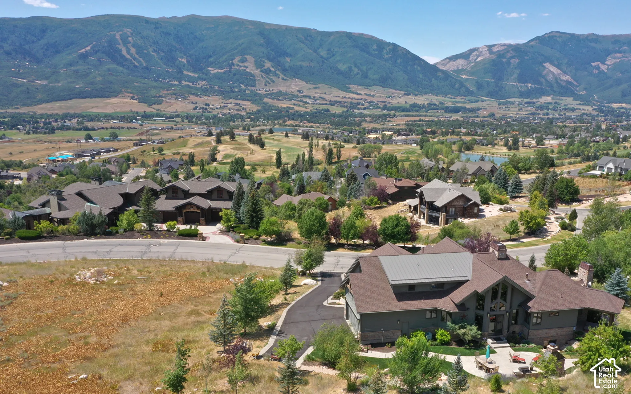 Aerial view of residential area featuring mountains