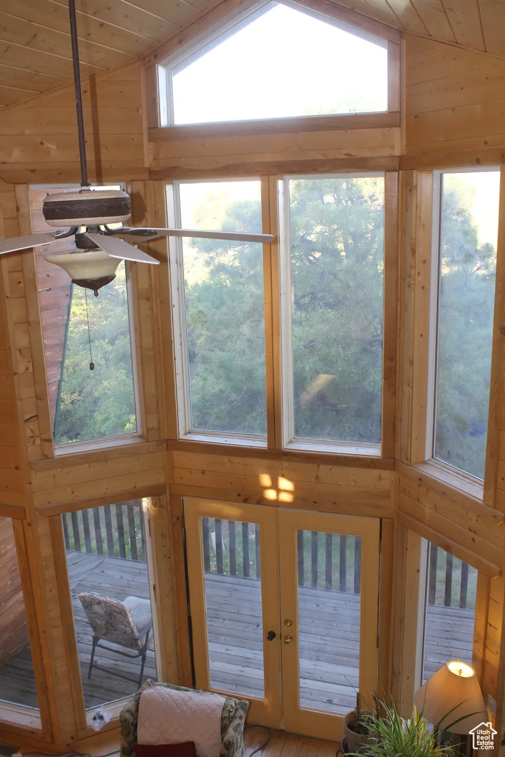 Entryway with healthy amount of natural light, french doors, wood ceiling, and high vaulted ceiling