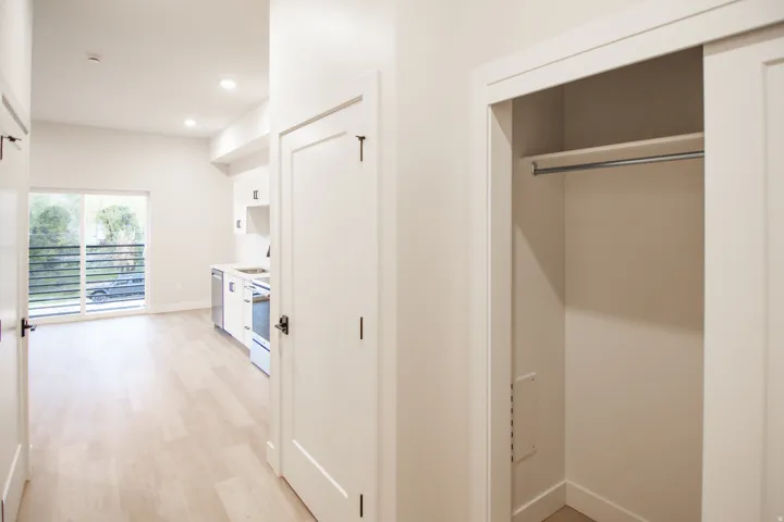 Corridor featuring recessed lighting and light wood finished floors