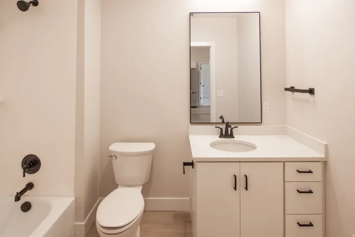 Full bathroom with vanity and bathing tub / shower combination