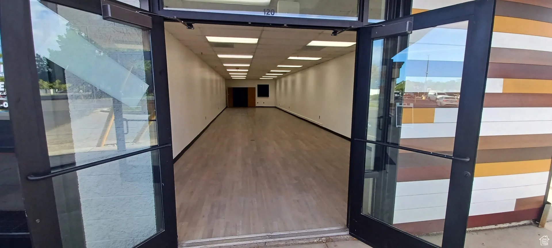 Hall with wood finished floors