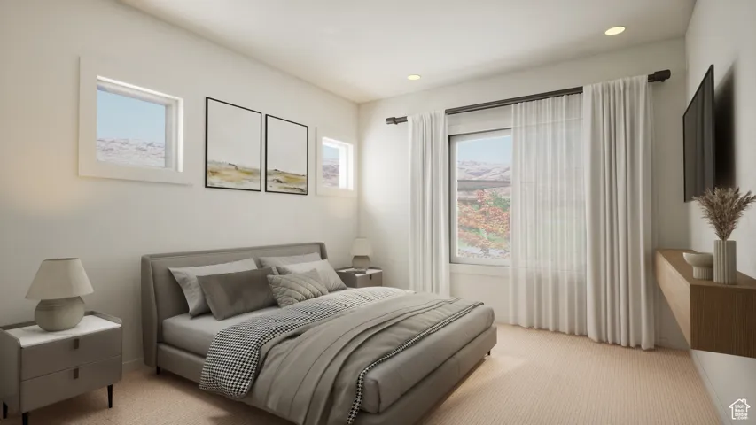 Carpeted bedroom with recessed lighting