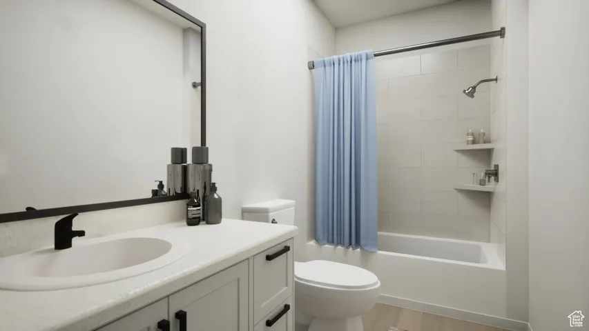 Bathroom featuring vanity, shower / tub combo with curtain, and light wood-style flooring
