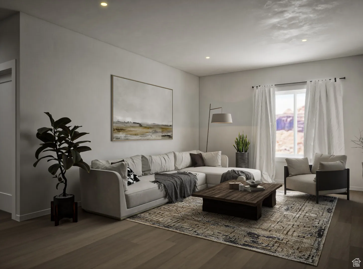 Living area with wood finished floors and recessed lighting