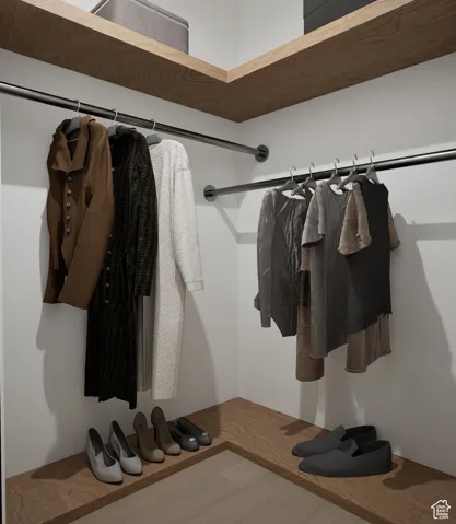 Walk in closet featuring light wood finished floors