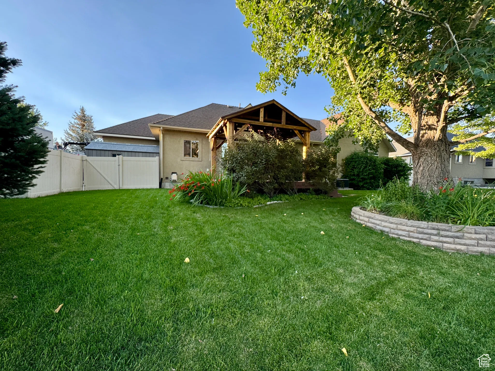 View of yard with a gate