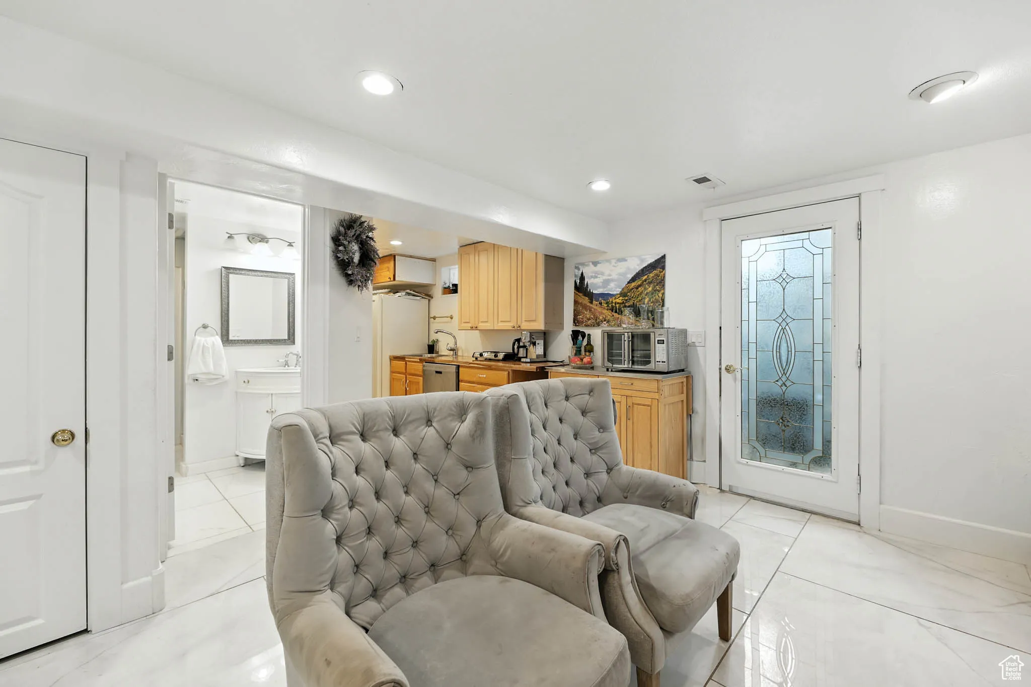 Living room with recessed lighting and baseboards