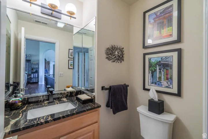 Bathroom with toilet and vanity
