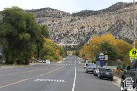 View of asphalt road with a mountain view